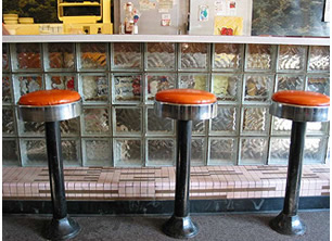 Sit at the counter and eat with the locals